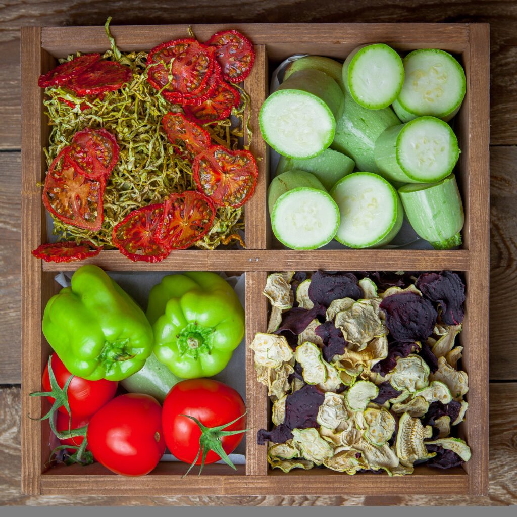 top view close up dried vegetables and fresh vegetables in wooden box